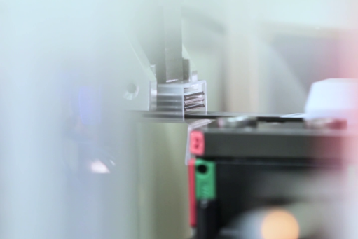 Blurred picture of the assembly of consumables at STRATEC