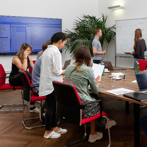 STRATEC employees during a meeting in a big meeting room in Austria