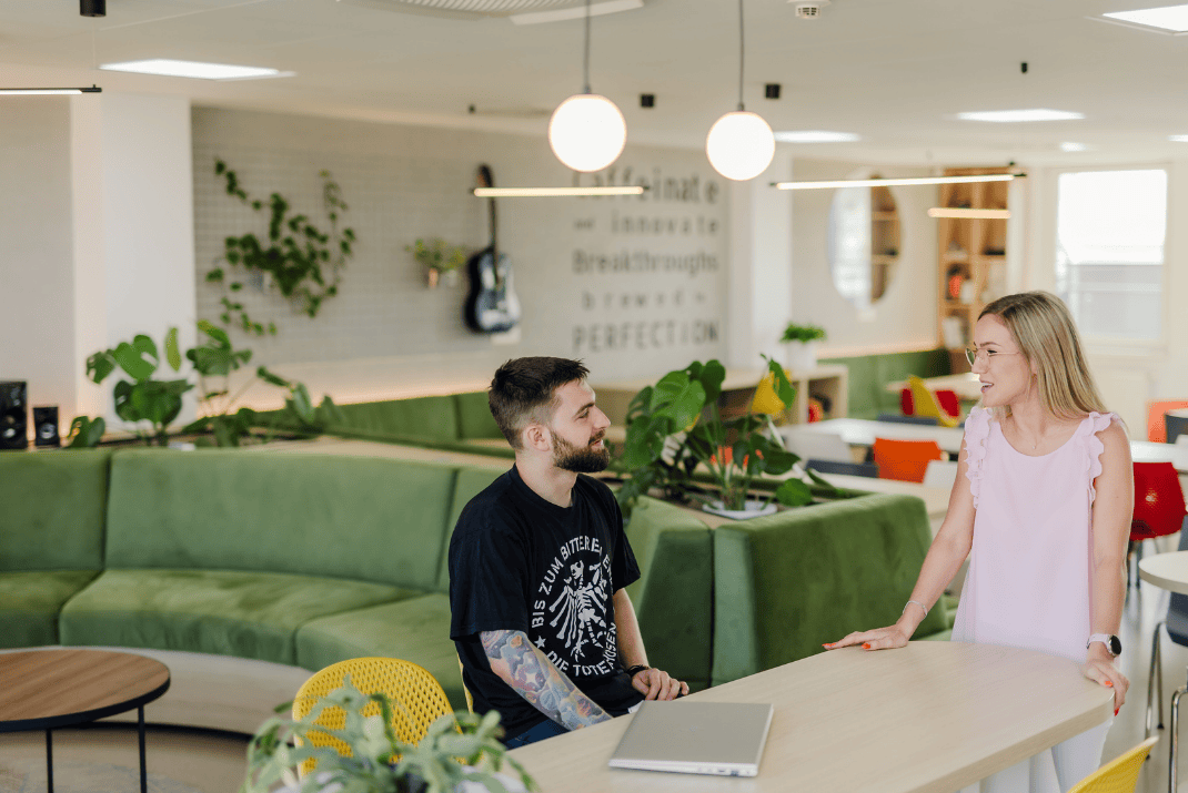 STRATEC employees talking in the canteen